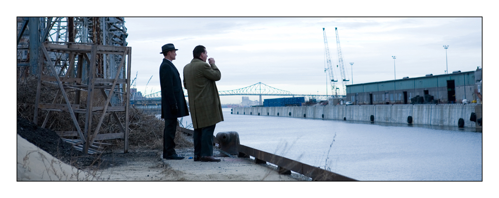 Colm Feore as Bishop and Remy Girard as Lucien Rivard